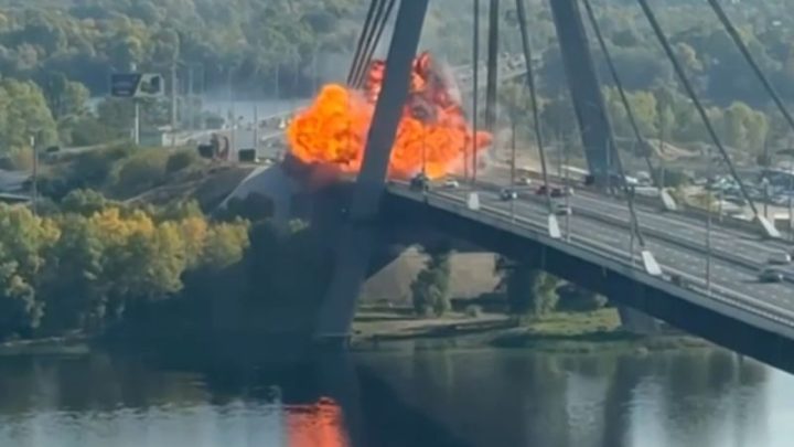 Russian drone slams into Kyiv bridge in escalating campaign as Germany’s chancellor arrives to airsirens and explosions