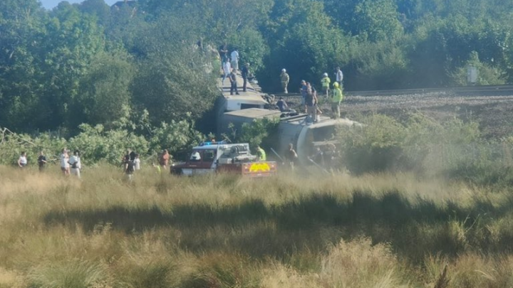 18 injured, 2 seriously, after passenger train derails in southern England
